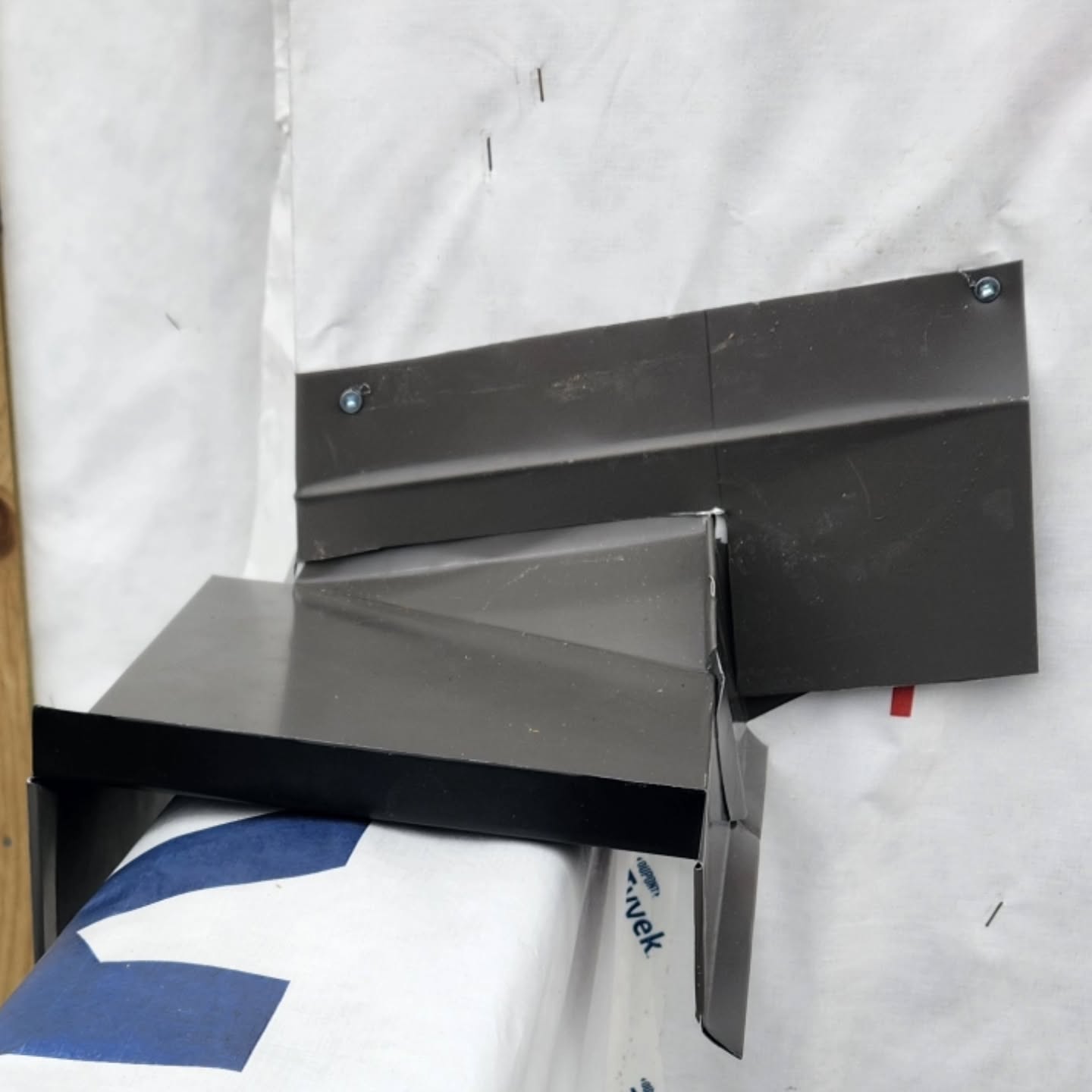 Sheet metal step flashing for Mission BC roofing project